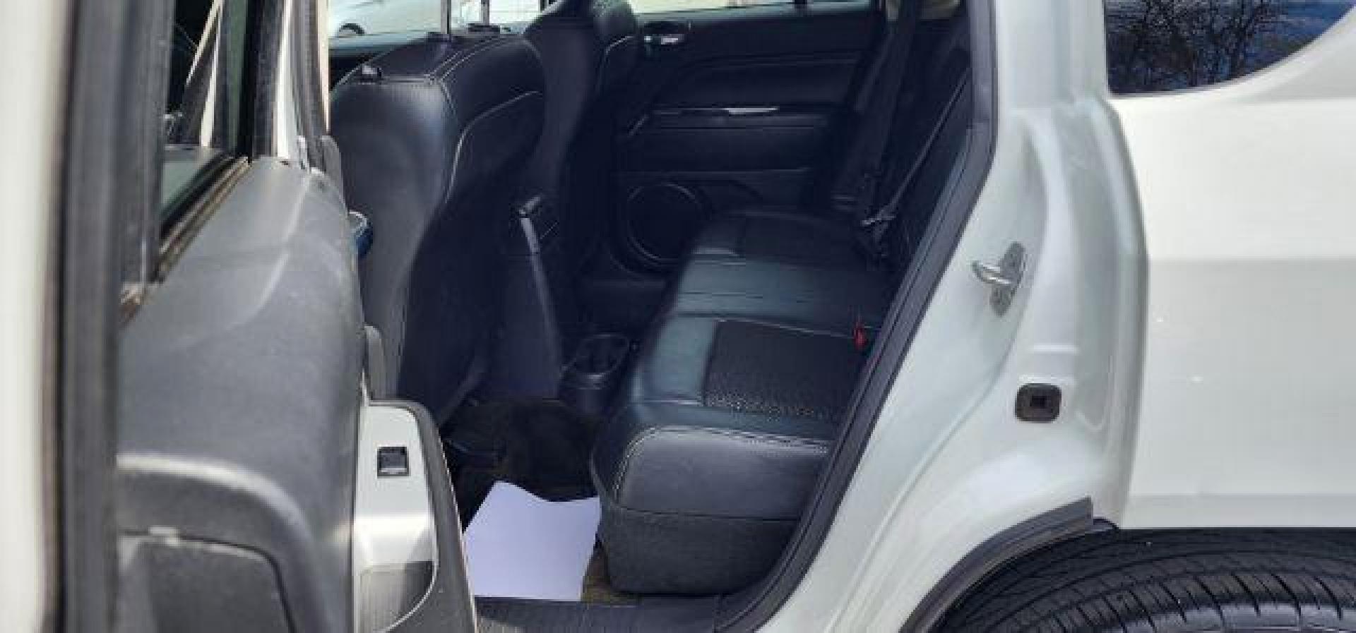 2016 WHITE /Dark Slate Gray/Light Pebble Beige, vinyl/cloth Jeep Compass Latitude 4WD (1C4NJDEB8GD) with an 2.4L L4 engine, AT transmission, located at 15520 McMullen Hwy SW, Belair, MD, 21502, (301) 729-3700, 39.581375, -78.846451 - Photo#8