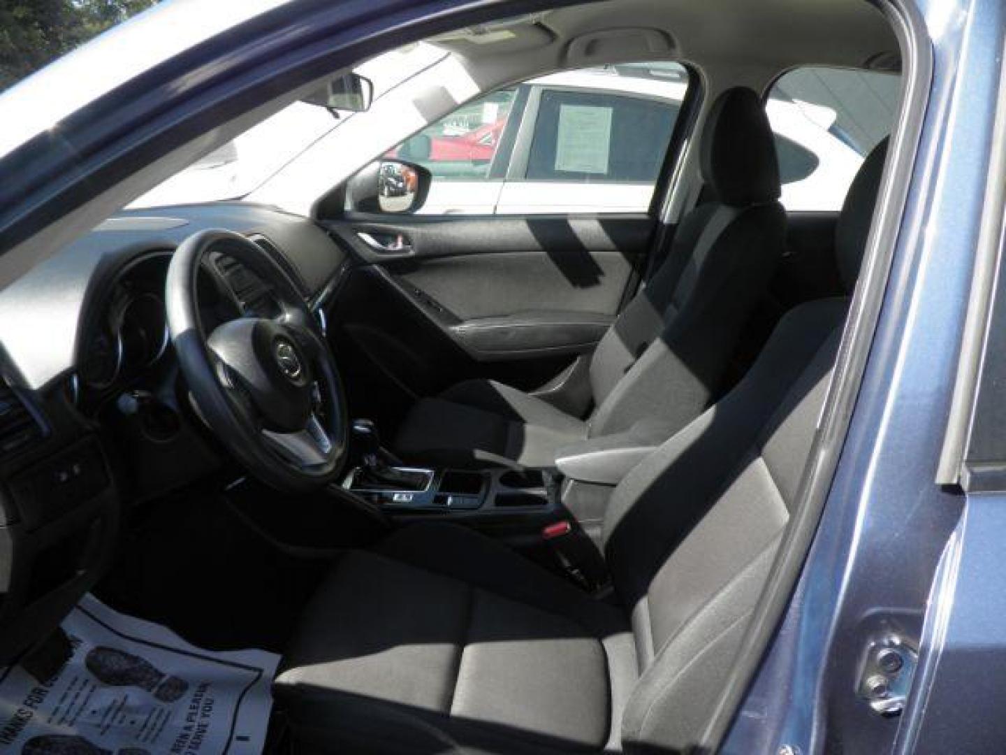 2016 Blue Mazda CX-5 Sport (JM3KE4BY5G0) with an 2.5L I4 engine, AT transmission, located at 19521 New George's Creek Rd SW, Barton, MD, 21521, (301) 463-2404, 39.524323, -79.017906 - Photo#1