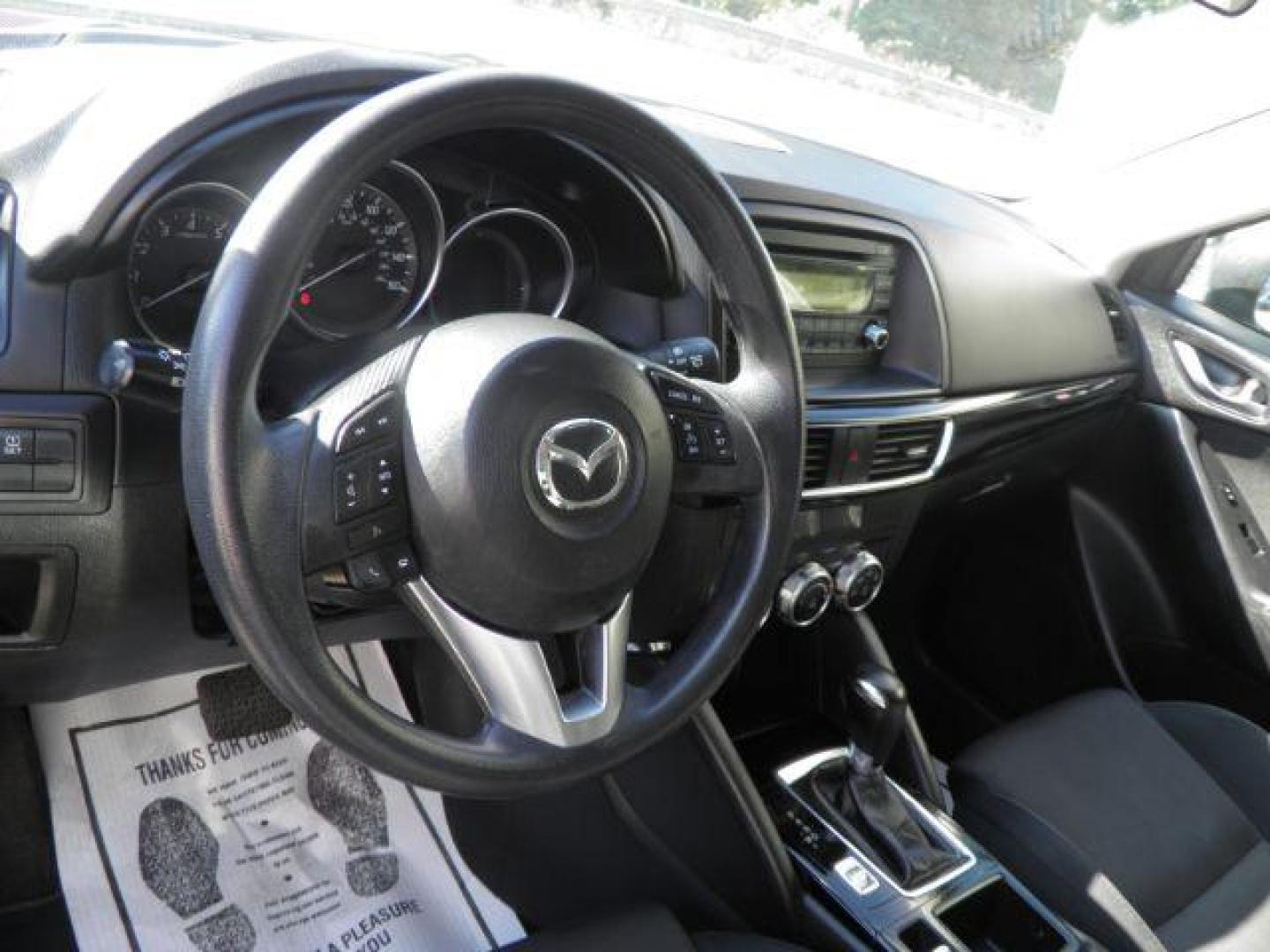 2016 Blue Mazda CX-5 Sport (JM3KE4BY5G0) with an 2.5L I4 engine, AT transmission, located at 19521 New George's Creek Rd SW, Barton, MD, 21521, (301) 463-2404, 39.524323, -79.017906 - Photo#2