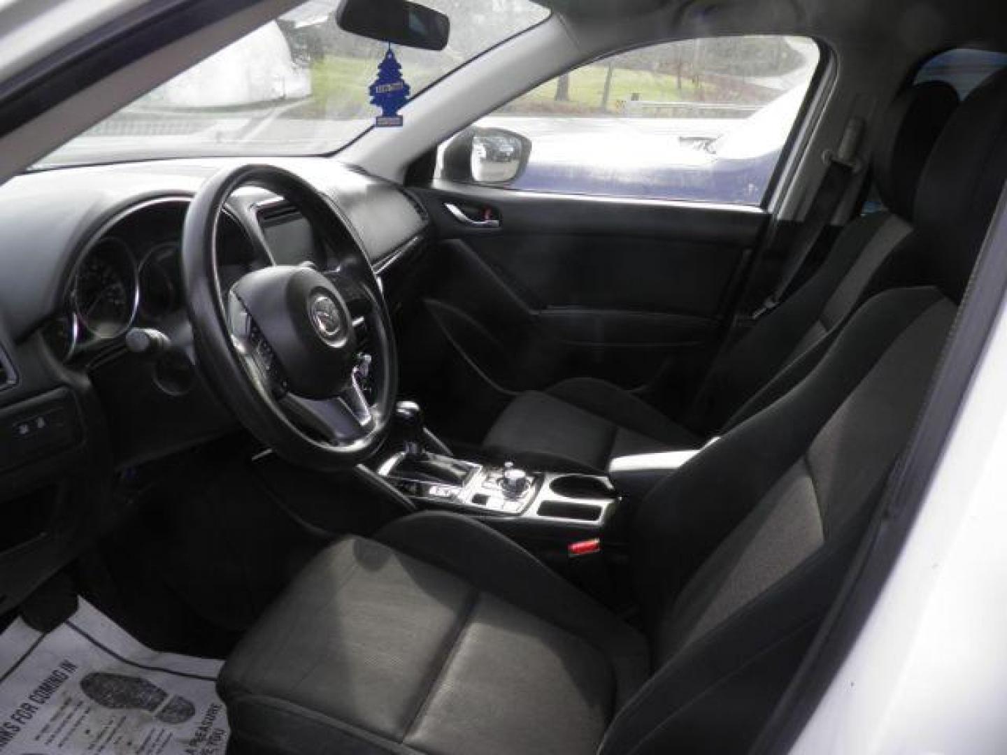 2016 WHITE Mazda CX-5 Sport (JM3KE4BY6G0) with an 2.5 L4 engine, CVT transmission, located at 19521 New George's Creek Rd SW, Barton, MD, 21521, (301) 463-2404, 39.524323, -79.017906 - Photo#1