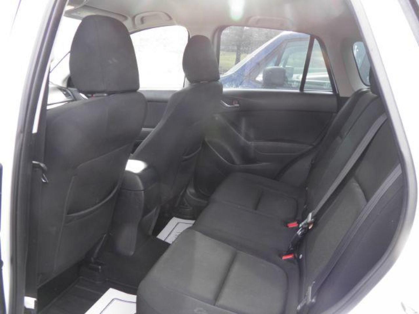 2016 WHITE Mazda CX-5 Sport (JM3KE4BY6G0) with an 2.5 L4 engine, CVT transmission, located at 19521 New George's Creek Rd SW, Barton, MD, 21521, (301) 463-2404, 39.524323, -79.017906 - Photo#3