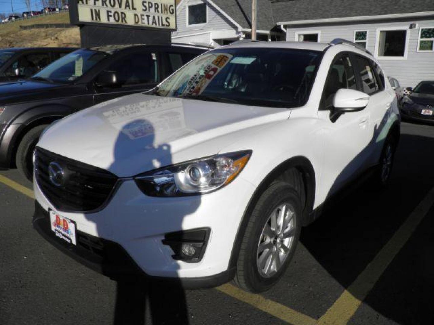 2016 White Mazda CX-5 Touring (JM3KE4CY9G0) with an 2.5L I4 engine, AT transmission, located at 15520 McMullen Hwy SW, Belair, MD, 21502, (301) 729-3700, 39.581375, -78.846451 - Photo#0