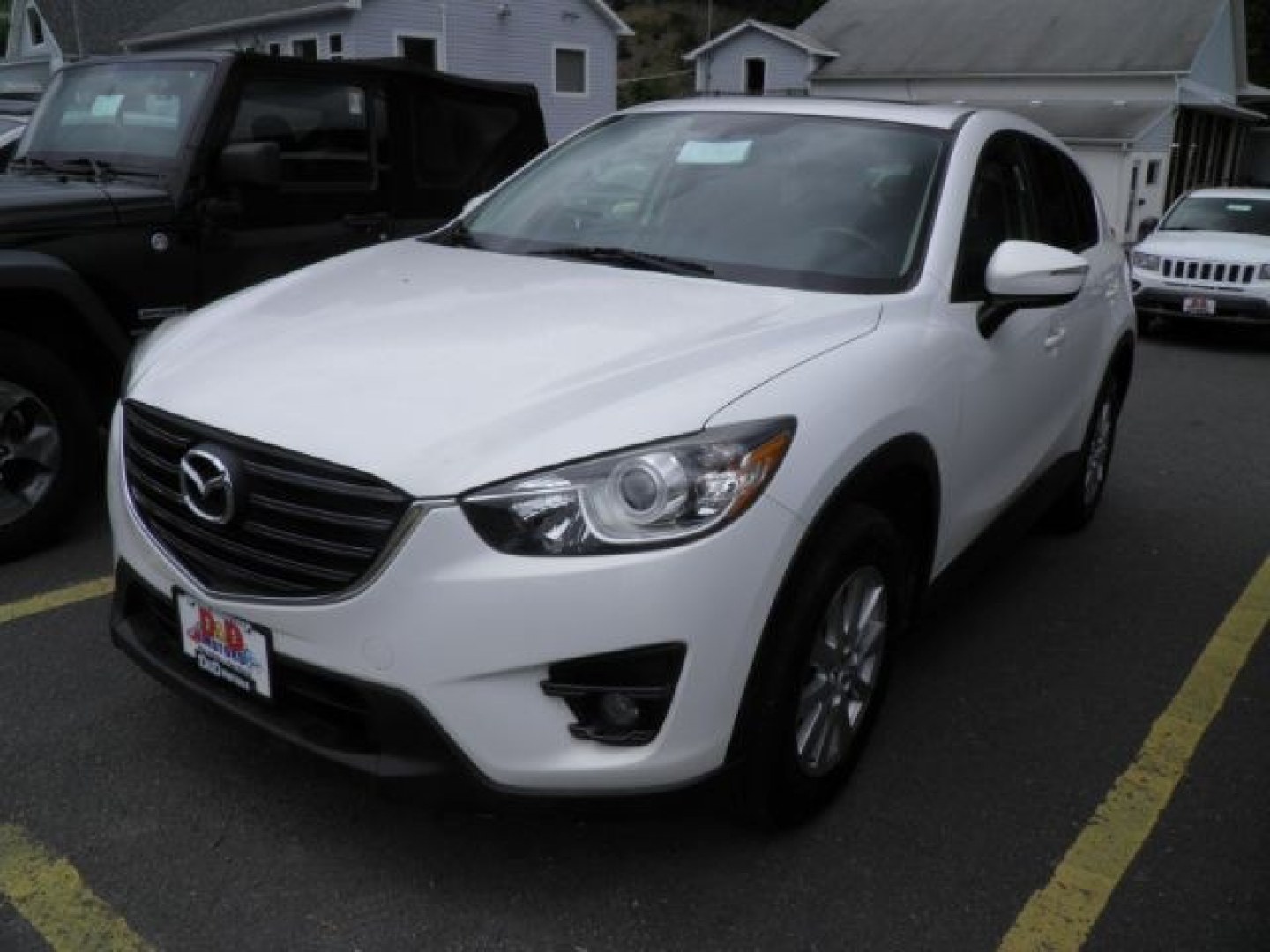 2016 WHITE Mazda CX-5 Touring (JM3KE4CY3G0) with an 2.5 L4 engine, AT transmission, located at 15520 McMullen Hwy SW, Belair, MD, 21502, (301) 729-3700, 39.581375, -78.846451- Photo#0