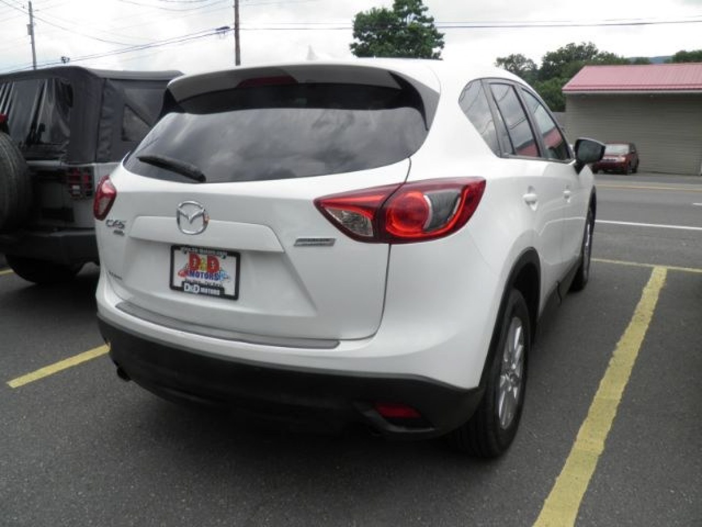 2016 WHITE Mazda CX-5 Touring (JM3KE4CY3G0) with an 2.5 L4 engine, AT transmission, located at 15520 McMullen Hwy SW, Belair, MD, 21502, (301) 729-3700, 39.581375, -78.846451- Photo#5