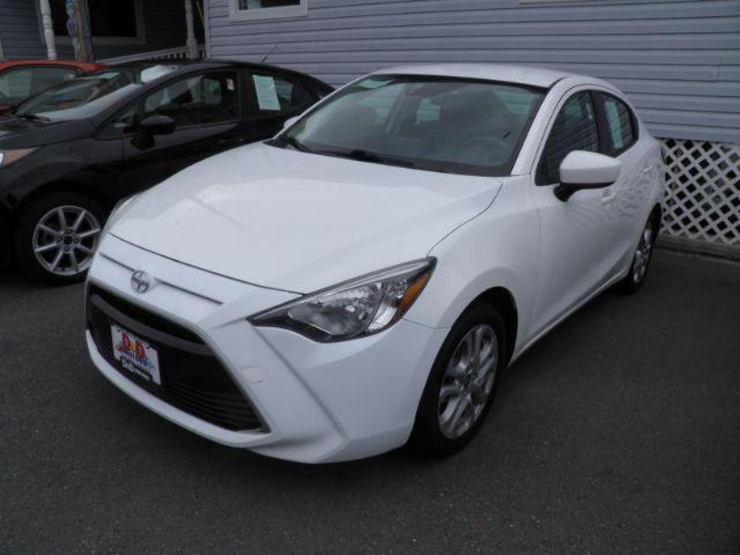 2016 White Scion iA BASE (3MYDLBZV7GY) with an 1.5L I4 engine, AT transmission, located at 15520 McMullen Hwy SW, Belair, MD, 21502, (301) 729-3700, 39.581375, -78.846451 - Photo#0