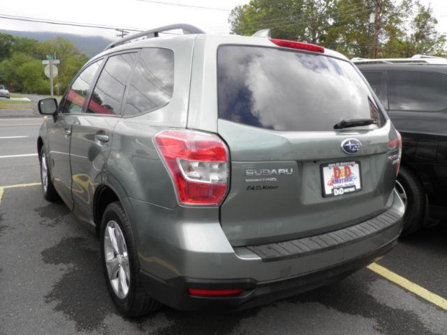 2016 Green Subaru Forester 2.5i Premium (JF2SJAGC5GH) with an 2.5L H4 engine, AT transmission, located at 19521 New George's Creek Rd SW, Barton, MD, 21521, (301) 463-2404, 39.524323, -79.017906 - Photo#5