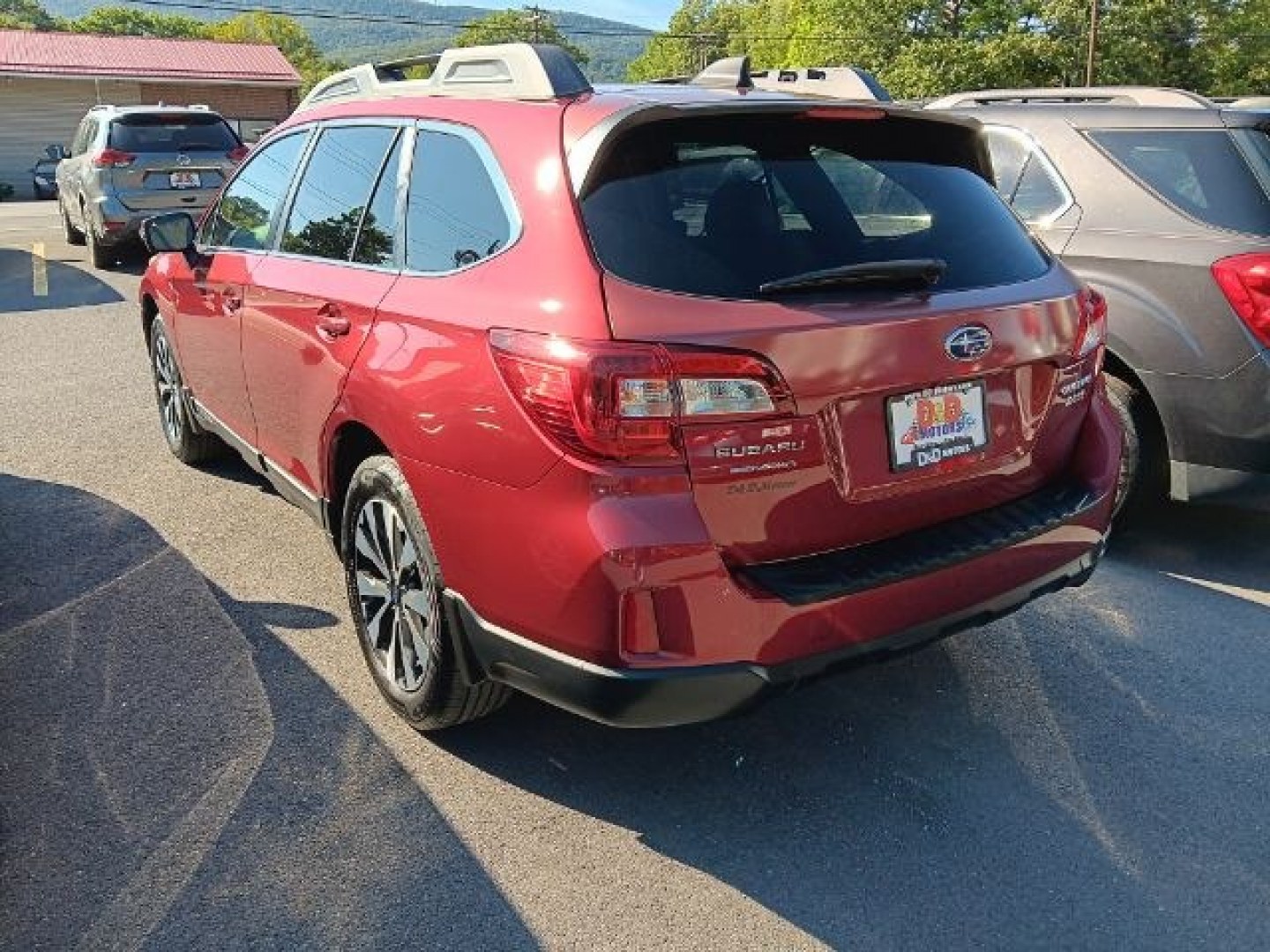 2016 RED Subaru Outback 2.5i Limited (4S4BSANCXG3) with an 2.5 L4 engine, AT transmission, located at 15520 McMullen Hwy SW, Belair, MD, 21502, (301) 729-3700, 39.581375, -78.846451- Photo#4
