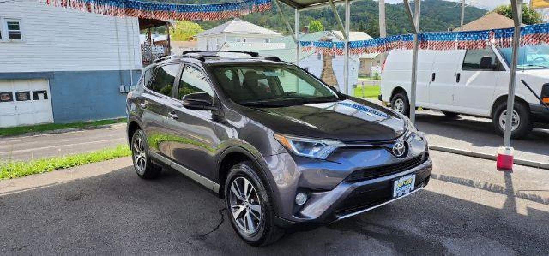 2016 Gray /Black, cloth Toyota RAV4 XLE AWD (JTMRFREV2GJ) with an 2.5L L4 engine, AT transmission, located at 15520 McMullen Hwy SW, Belair, MD, 21502, (301) 729-3700, 39.581375, -78.846451 - FOR A BETTER PRICE CALL PAUL AT 301-268-8150 - Photo#0