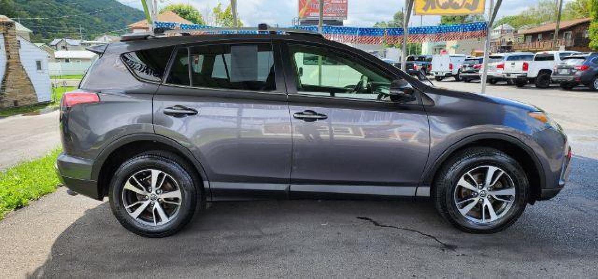 2016 Gray /Black, cloth Toyota RAV4 XLE AWD (JTMRFREV2GJ) with an 2.5L L4 engine, AT transmission, located at 15520 McMullen Hwy SW, Belair, MD, 21502, (301) 729-3700, 39.581375, -78.846451 - FOR A BETTER PRICE CALL PAUL AT 301-268-8150 - Photo#12