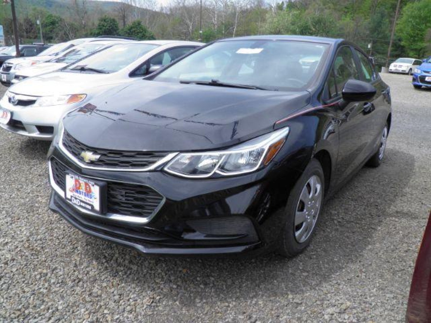 2017 BLACK Chevrolet Cruze LS Auto (1G1BC5SM1H7) with an 1.4l L4T engine, AT transmission, located at 19521 New George's Creek Rd SW, Barton, MD, 21521, (301) 463-2404, 39.524323, -79.017906- Photo#0