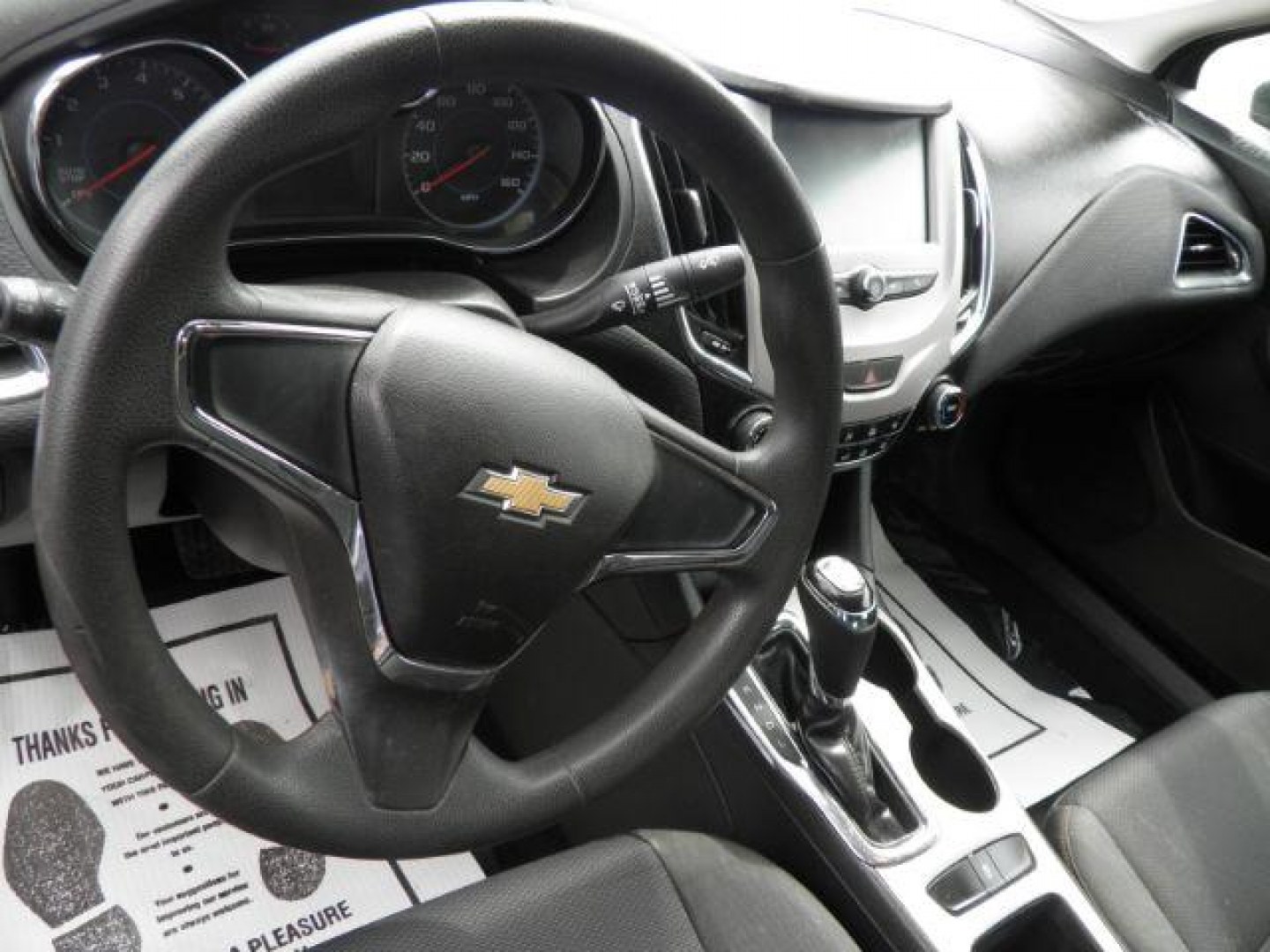2017 BLACK Chevrolet Cruze LS Auto (1G1BC5SM1H7) with an 1.4l L4T engine, AT transmission, located at 19521 New George's Creek Rd SW, Barton, MD, 21521, (301) 463-2404, 39.524323, -79.017906- Photo#2