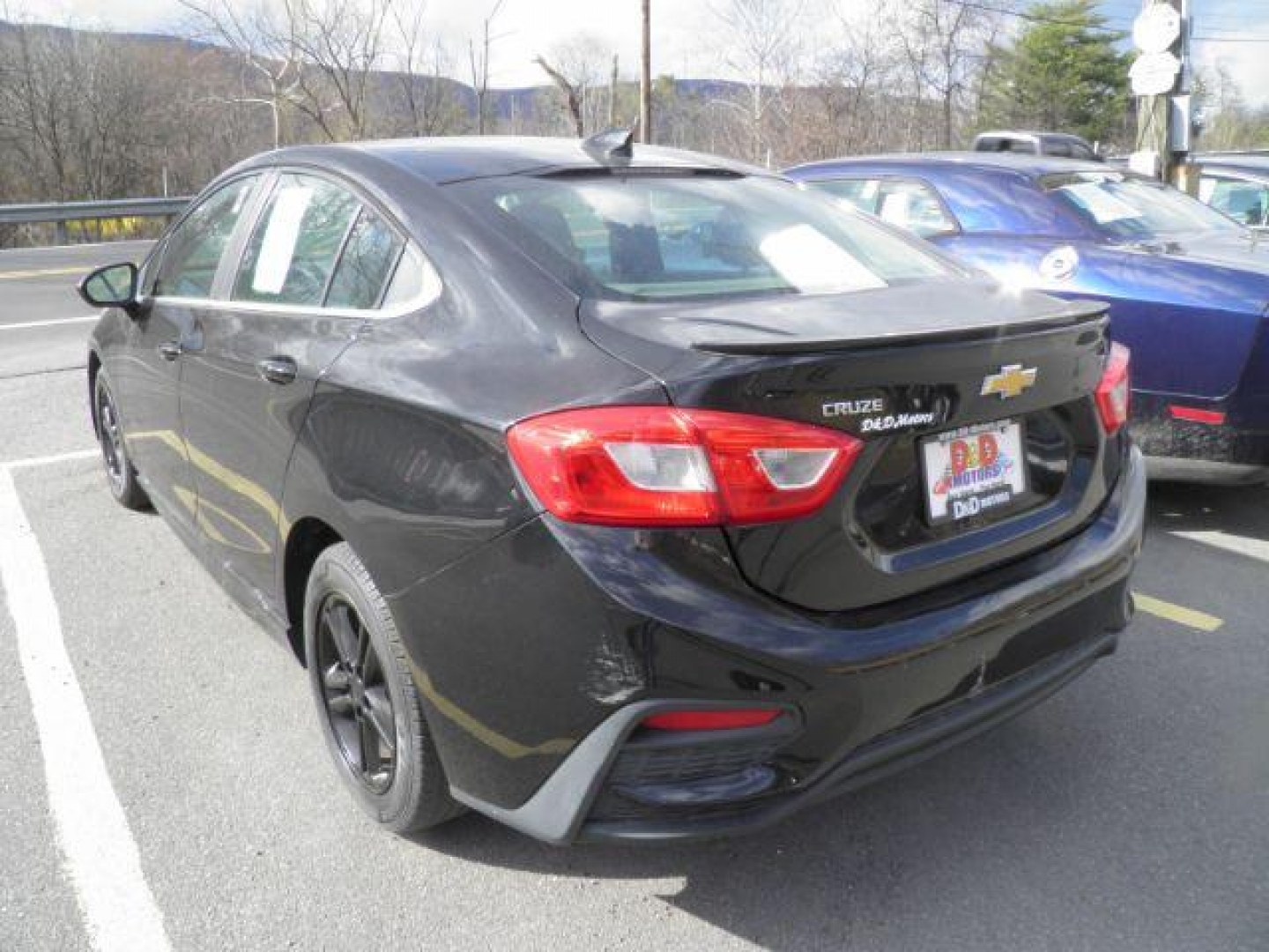 2017 Black Chevrolet Cruze LT Manual (1G1BD5SM9H7) with an 1.4L I4 engine, MAN transmission, located at 15520 McMullen Hwy SW, Belair, MD, 21502, (301) 729-3700, 39.581375, -78.846451 - Photo#4