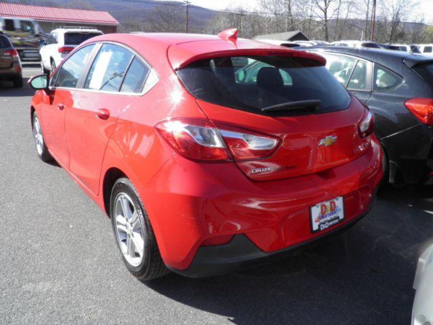 2017 RED Chevrolet Cruze LT Auto Hatchback (3G1BE6SM1HS) with an 1.4L 4L engine, AT transmission, located at 15520 McMullen Hwy SW, Belair, MD, 21502, (301) 729-3700, 39.581375, -78.846451- Photo#5