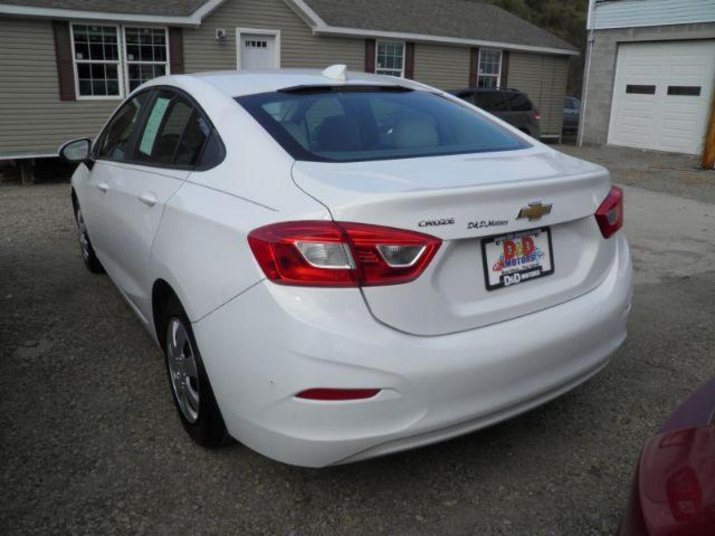 2017 WHITE Chevrolet Cruze LS Auto (1G1BC5SM8H7) with an 1.4L 4L engine, AT transmission, located at 19521 New George's Creek Rd SW, Barton, MD, 21521, (301) 463-2404, 39.524323, -79.017906 - Photo#4