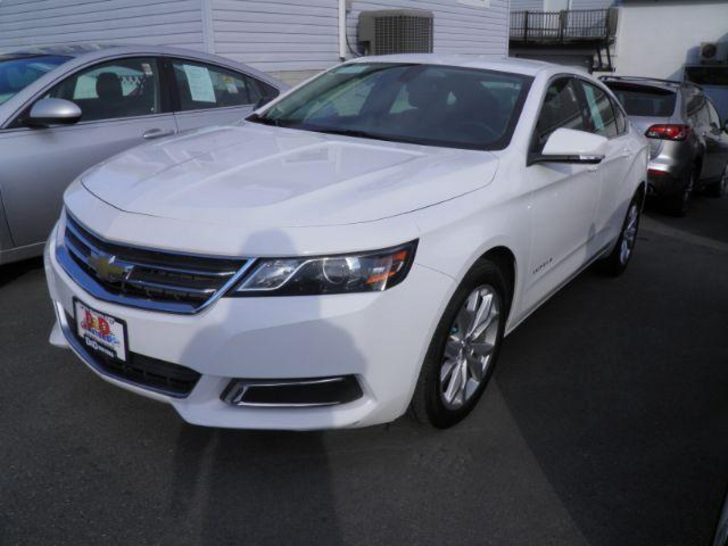 2017 White Chevrolet Impala LT (2G1105S31H9) with an 3.6L V6 engine, AT transmission, located at 15520 McMullen Hwy SW, Belair, MD, 21502, (301) 729-3700, 39.581375, -78.846451 - Photo#0