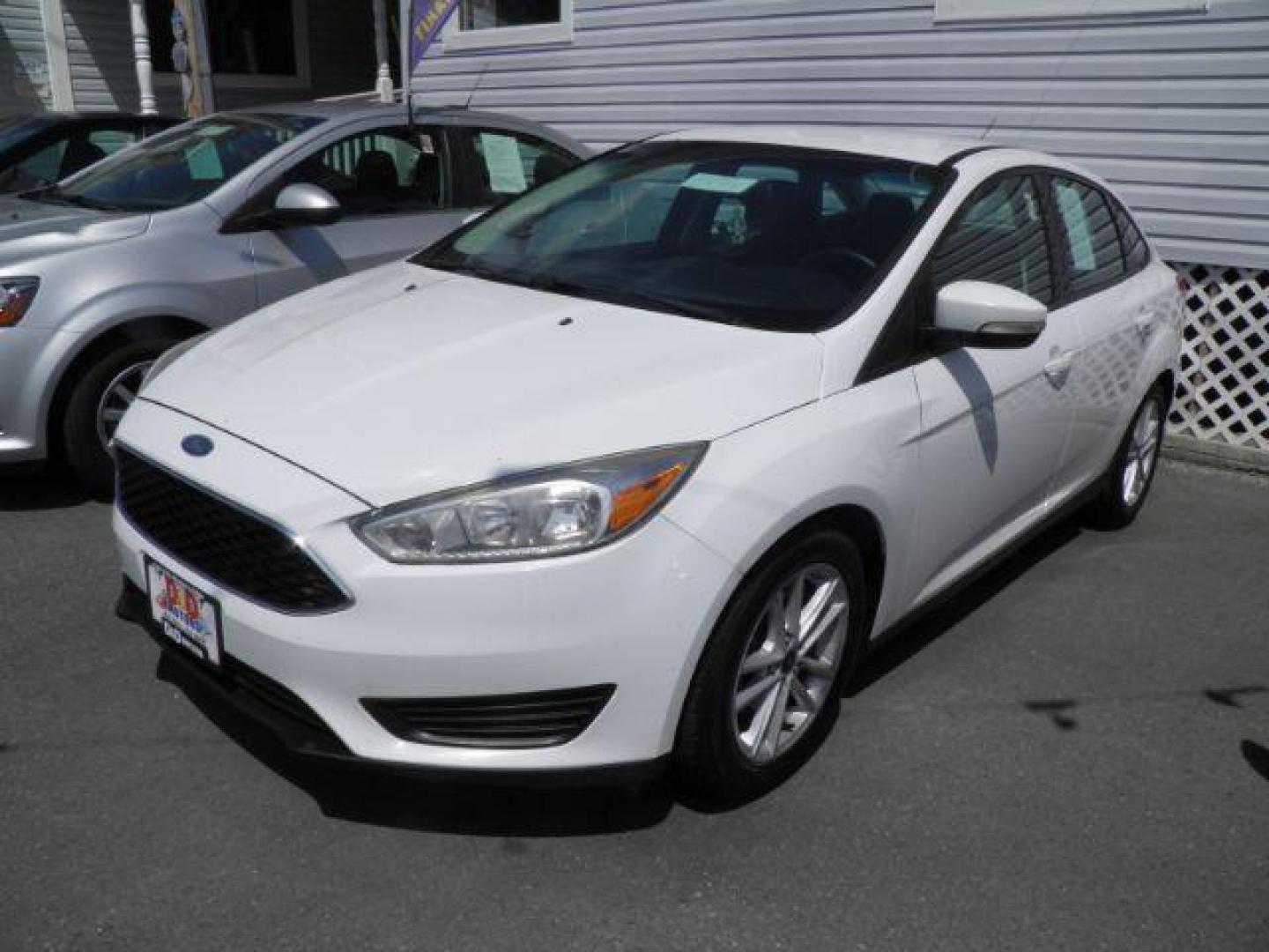 2017 White Ford Focus SE Sedan (1FADP3F25HL) with an 2.4L I4 engine, AT transmission, located at 15520 McMullen Hwy SW, Belair, MD, 21502, (301) 729-3700, 39.581375, -78.846451 - Photo#0