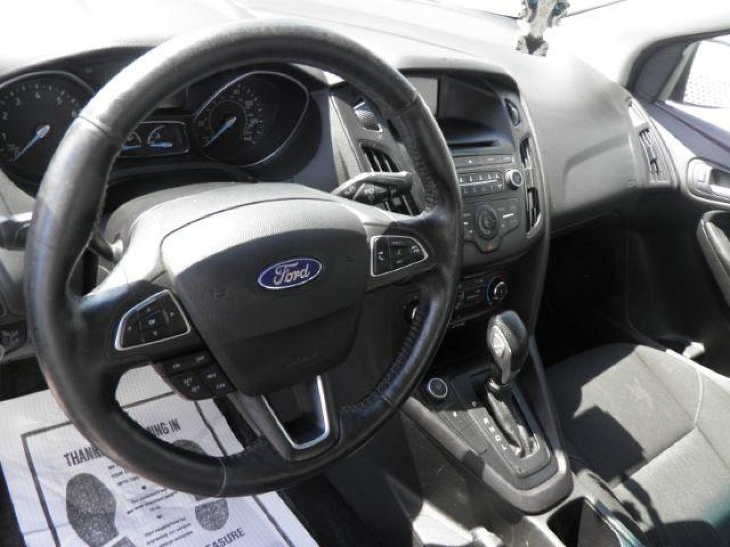 2017 White Ford Focus SE Sedan (1FADP3F25HL) with an 2.4L I4 engine, AT transmission, located at 15520 McMullen Hwy SW, Belair, MD, 21502, (301) 729-3700, 39.581375, -78.846451 - Photo#2