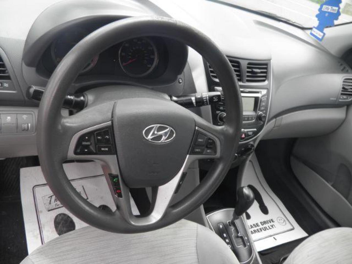 2017 Red Hyundai Accent Value Edition (KMHCT4AEXHU) with an 1.6L I4 engine, AT transmission, located at 19521 New George's Creek Rd SW, Barton, MD, 21521, (301) 463-2404, 39.524323, -79.017906 - Photo#2