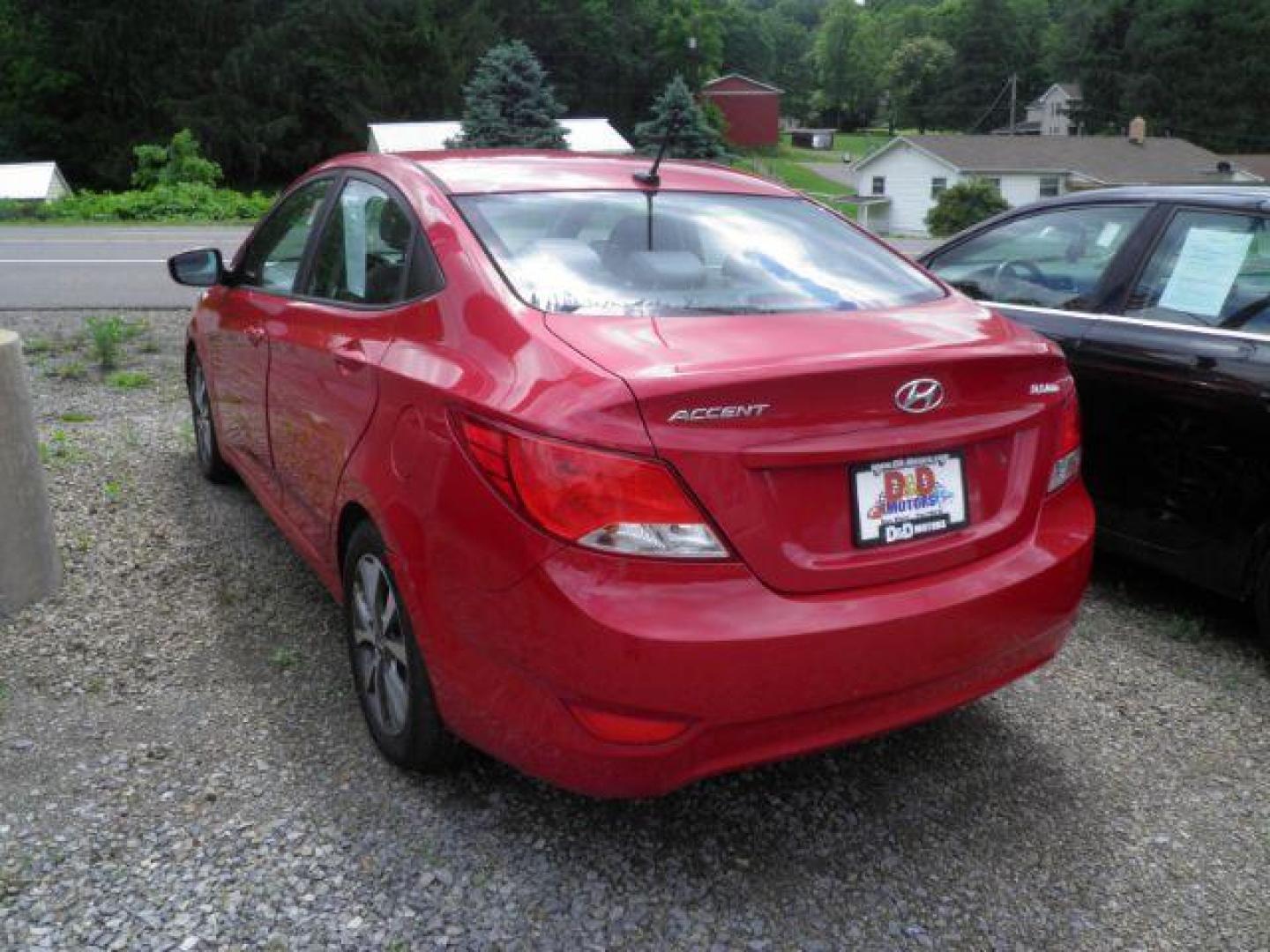 2017 Red Hyundai Accent Value Edition (KMHCT4AEXHU) with an 1.6L I4 engine, AT transmission, located at 19521 New George's Creek Rd SW, Barton, MD, 21521, (301) 463-2404, 39.524323, -79.017906 - Photo#4