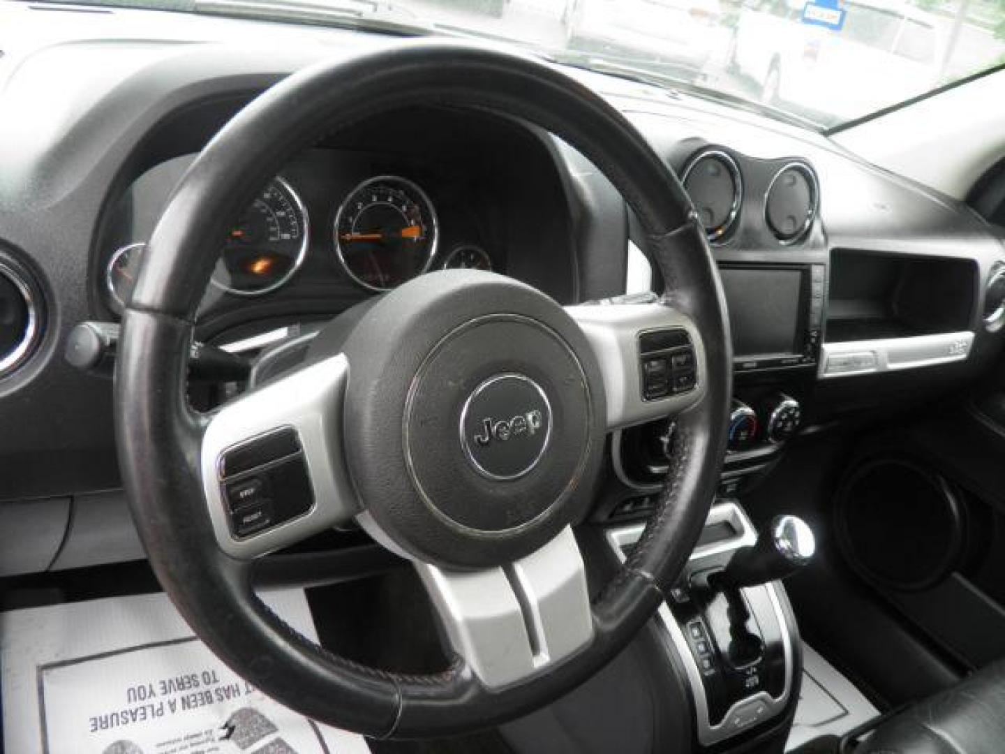 2017 Gray Jeep Compass High Altitude 4x4 (1C4NJDEBXHD) with an 2.4L I4 engine, located at 19521 New George's Creek Rd SW, Barton, MD, 21521, (301) 463-2404, 39.524323, -79.017906 - Photo#2