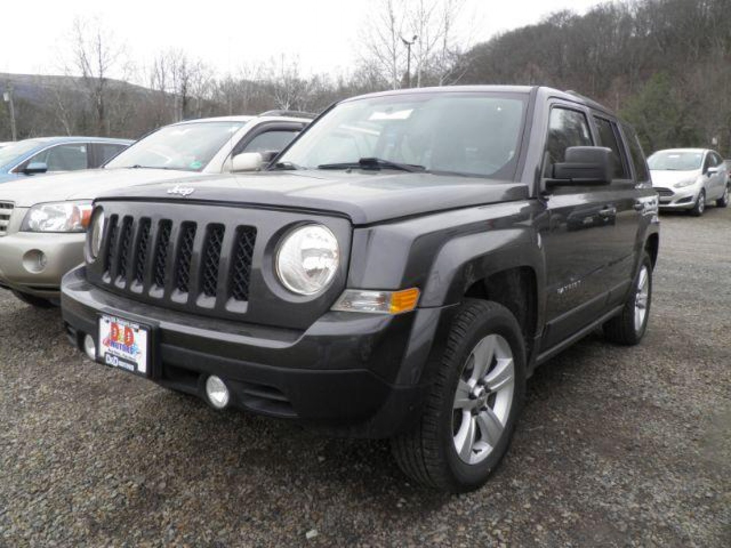 2017 GRAY Jeep Patriot Latitude 4x4 (1C4NJRFB1HD) with an 2.4L L4 engine, AT transmission, located at 19521 New George's Creek Rd SW, Barton, MD, 21521, (301) 463-2404, 39.524323, -79.017906 - Photo#0
