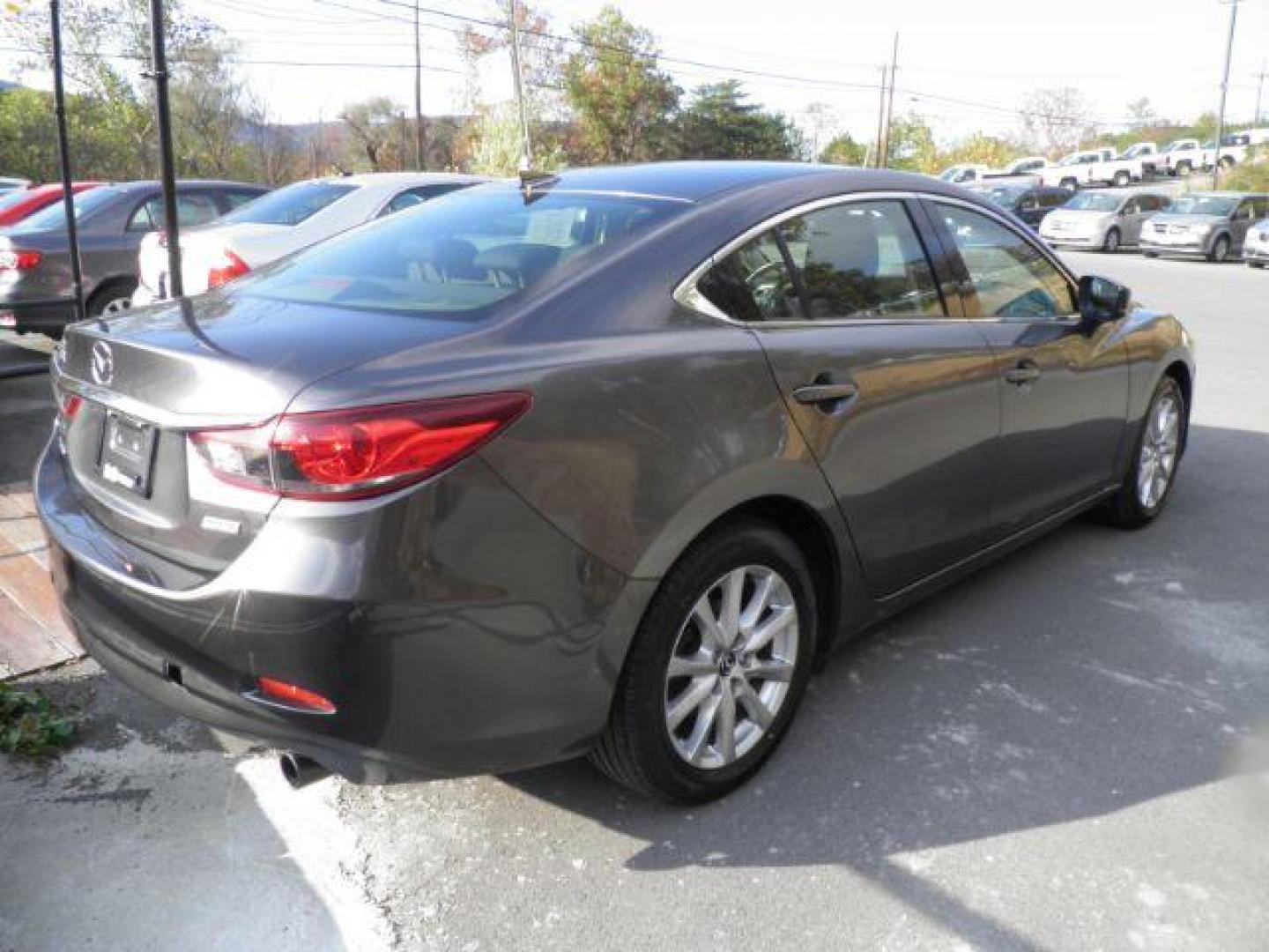2017 Gray Mazda Mazda6 i Sport AT (JM1GL1U58H1) with an 2.5L I4 engine, AT transmission, located at 19521 New George's Creek Rd SW, Barton, MD, 21521, (301) 463-2404, 39.524323, -79.017906 - Photo#4