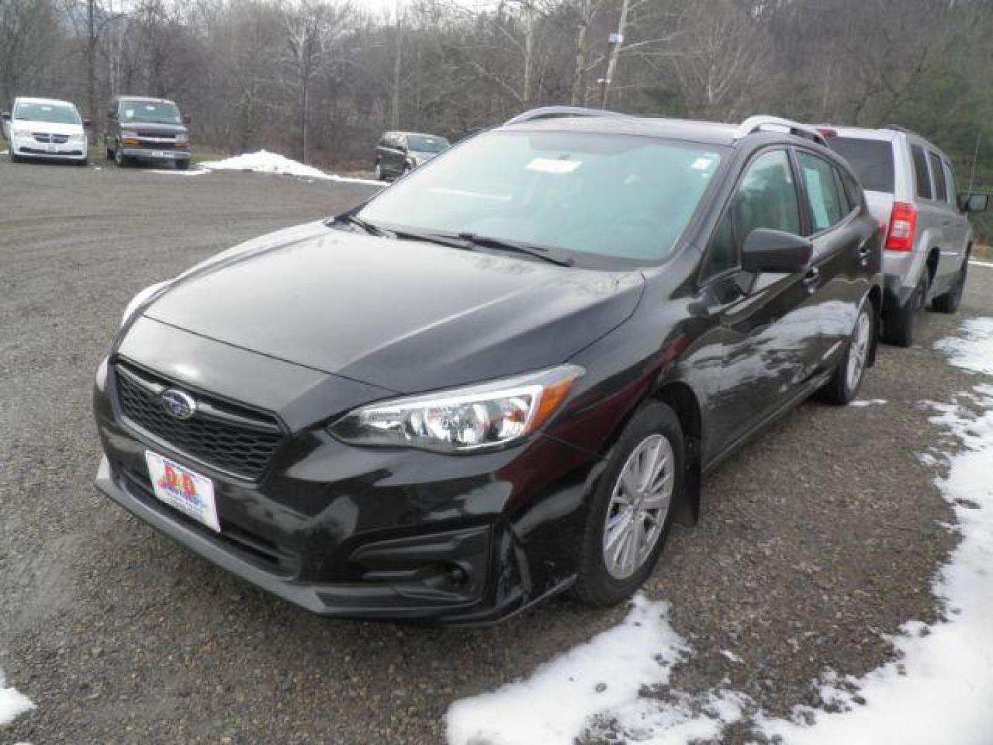 2017 BLACK Subaru Impreza 2.0i Premium (4S3GTAB65H3) with an 2.0L L4 engine, CVT transmission, located at 19521 New George's Creek Rd SW, Barton, MD, 21521, (301) 463-2404, 39.524323, -79.017906 - Photo#0