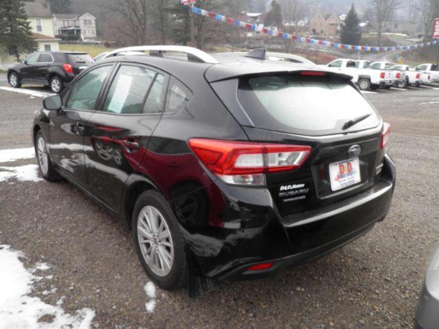 2017 BLACK Subaru Impreza 2.0i Premium (4S3GTAB65H3) with an 2.0L L4 engine, CVT transmission, located at 19521 New George's Creek Rd SW, Barton, MD, 21521, (301) 463-2404, 39.524323, -79.017906 - Photo#5
