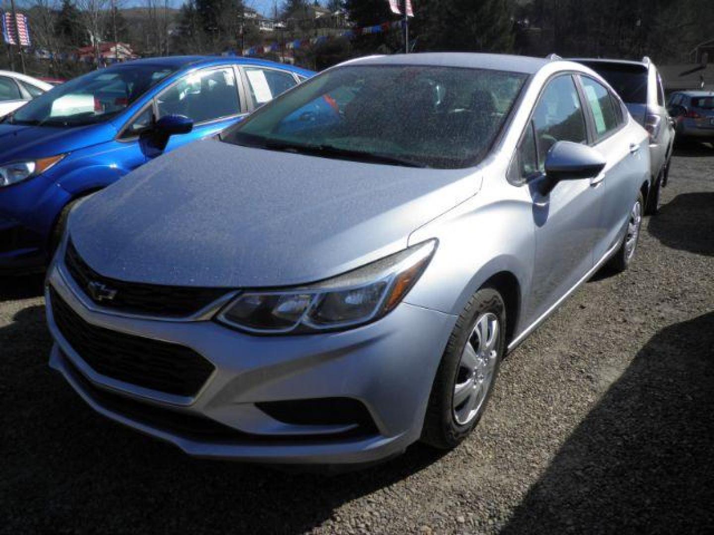2018 Silver Chevrolet Cruze LS Auto (1G1BC5SM9J7) with an 1.4L I4 engine, AT transmission, located at 19521 New George's Creek Rd SW, Barton, MD, 21521, (301) 463-2404, 39.524323, -79.017906 - Photo#0