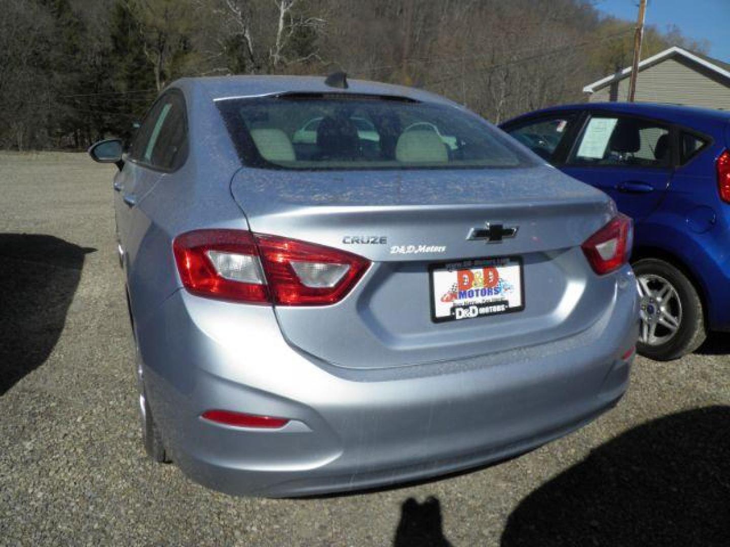 2018 Silver Chevrolet Cruze LS Auto (1G1BC5SM9J7) with an 1.4L I4 engine, AT transmission, located at 19521 New George's Creek Rd SW, Barton, MD, 21521, (301) 463-2404, 39.524323, -79.017906 - Photo#4