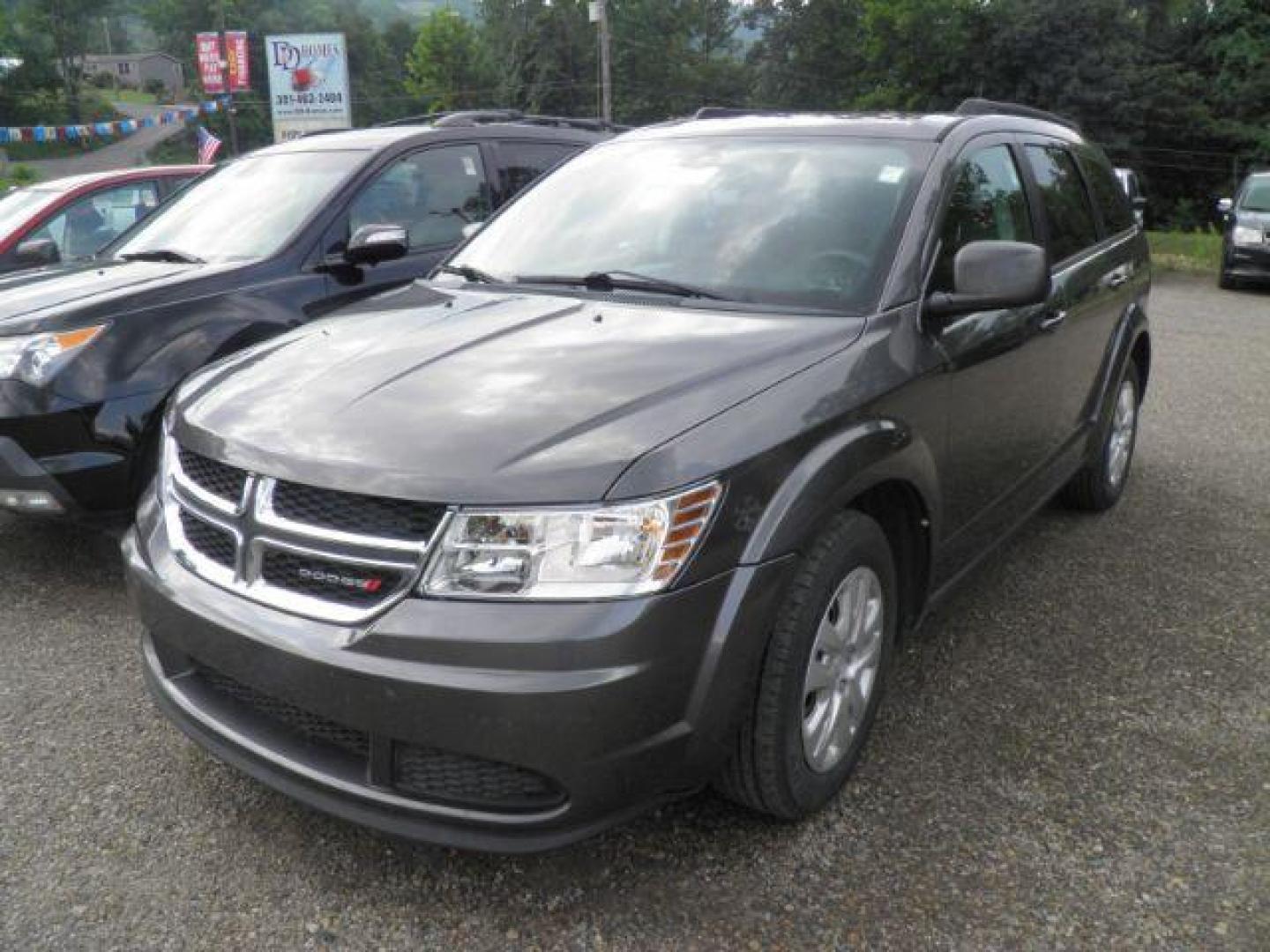 2018 GRAY Dodge Journey SE (3C4PDCAB3JT) with an 2.4L L4 engine, AT transmission, located at 19521 New George's Creek Rd SW, Barton, MD, 21521, (301) 463-2404, 39.524323, -79.017906 - Photo#0