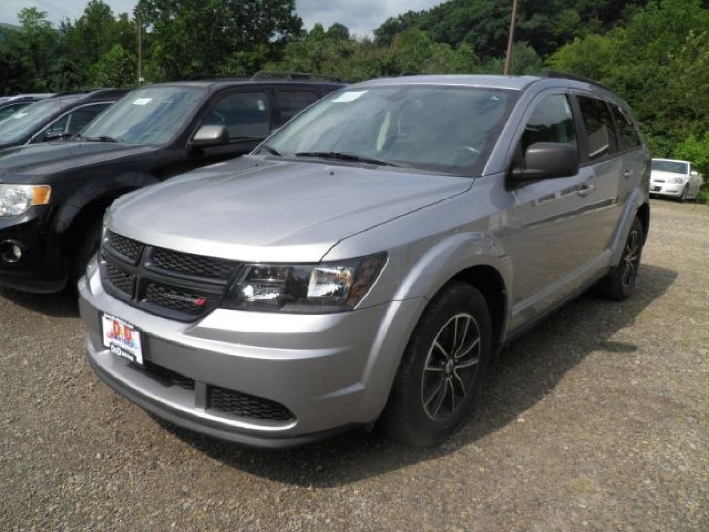 2018 SILVER Dodge Journey SE (3C4PDCAB5JT) with an 2.4L L4 engine, CVT transmission, located at 19521 New George's Creek Rd SW, Barton, MD, 21521, (301) 463-2404, 39.524323, -79.017906- Photo#0