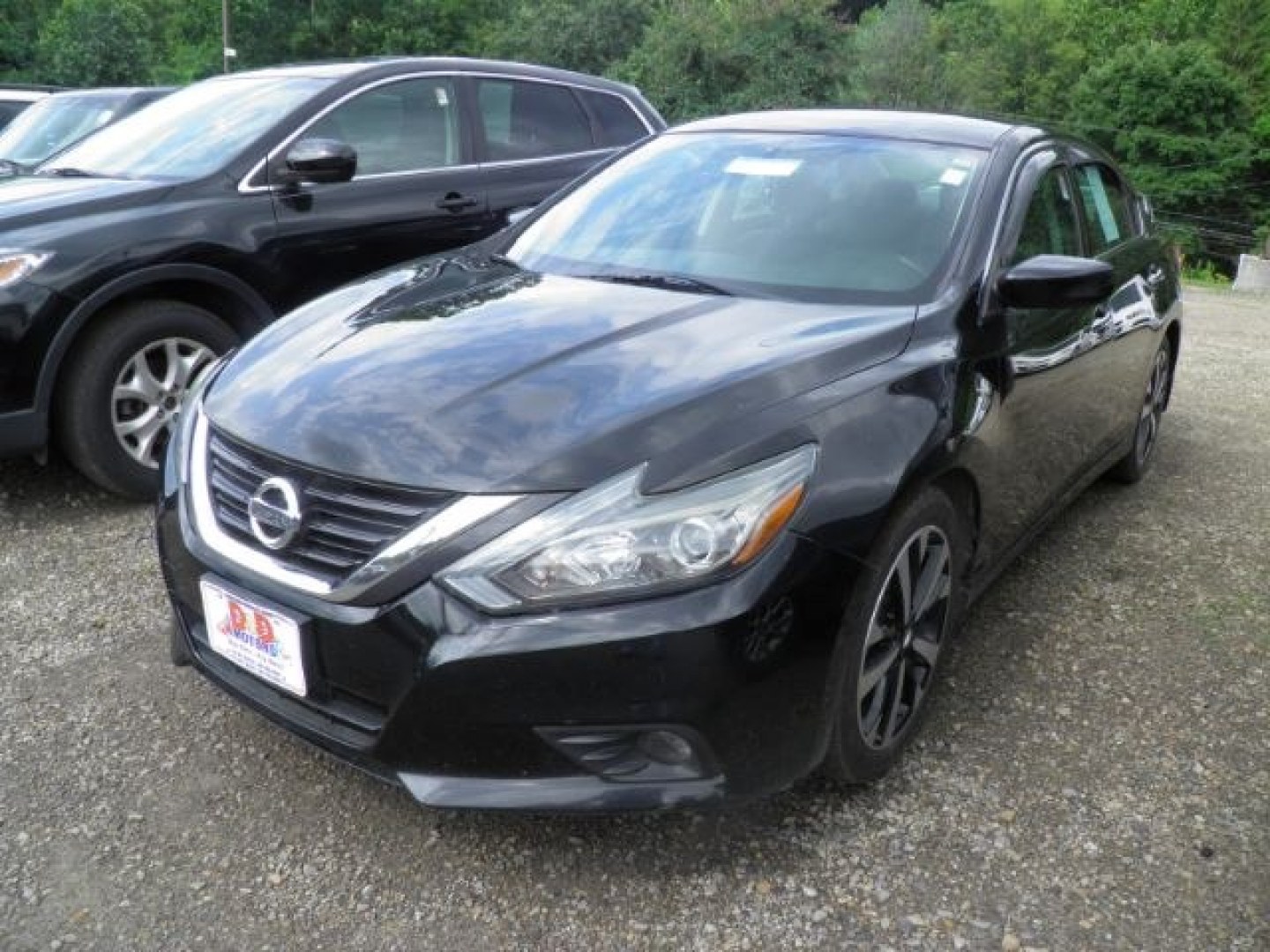 2018 BLACK Nissan Altima 2.5 SR (1N4AL3AP4JC) with an 2.5 L4 engine, CVT transmission, located at 19521 New George's Creek Rd SW, Barton, MD, 21521, (301) 463-2404, 39.524323, -79.017906- Photo#0