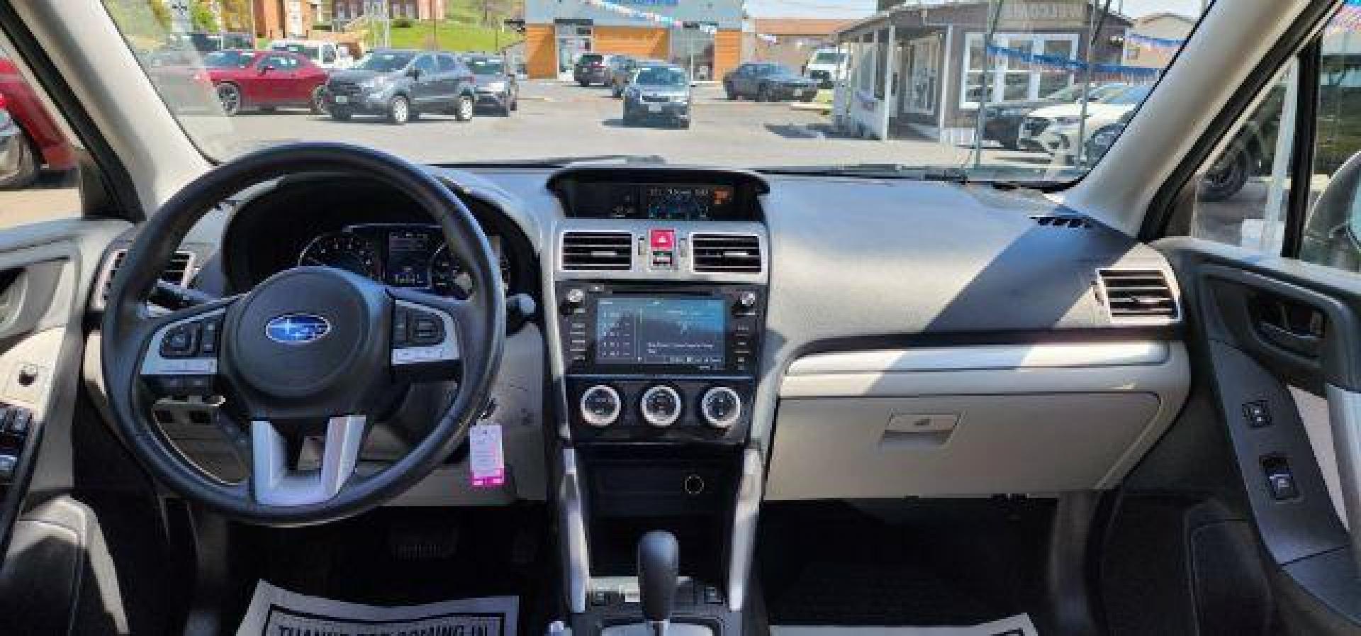 2018 White /Gray Subaru Forester 2.5i Premium (JF2SJAGC2JH) with an 2.5L H4 engine, AT transmission, located at 15520 McMullen Hwy SW, Belair, MD, 21502, (301) 729-3700, 39.581375, -78.846451 - Photo#4