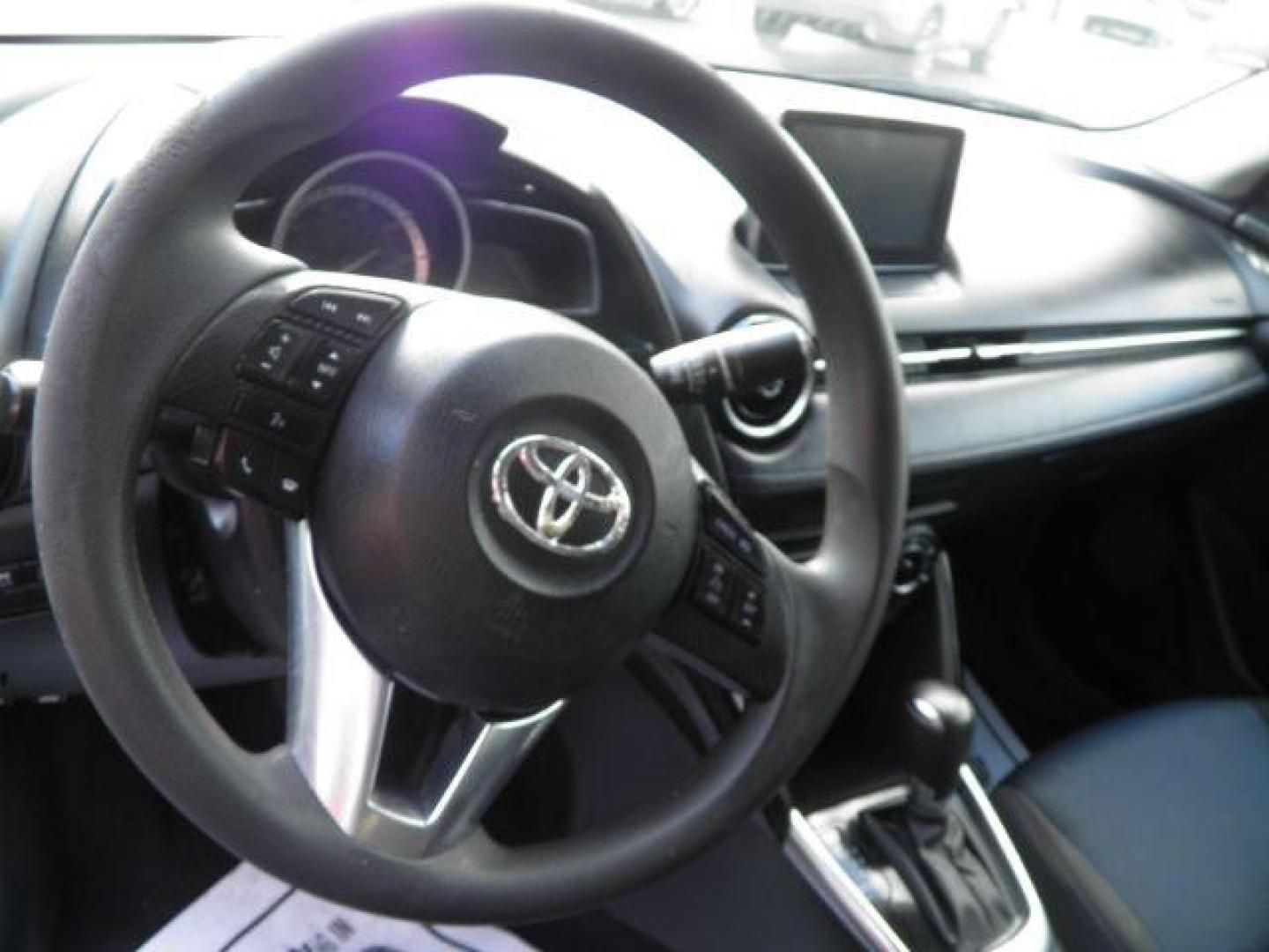 2018 White Toyota Yaris iA 6A (3MYDLBYV8JY) with an 1.5L I4 engine, AT transmission, located at 15520 McMullen Hwy SW, Belair, MD, 21502, (301) 729-3700, 39.581375, -78.846451 - Photo#2