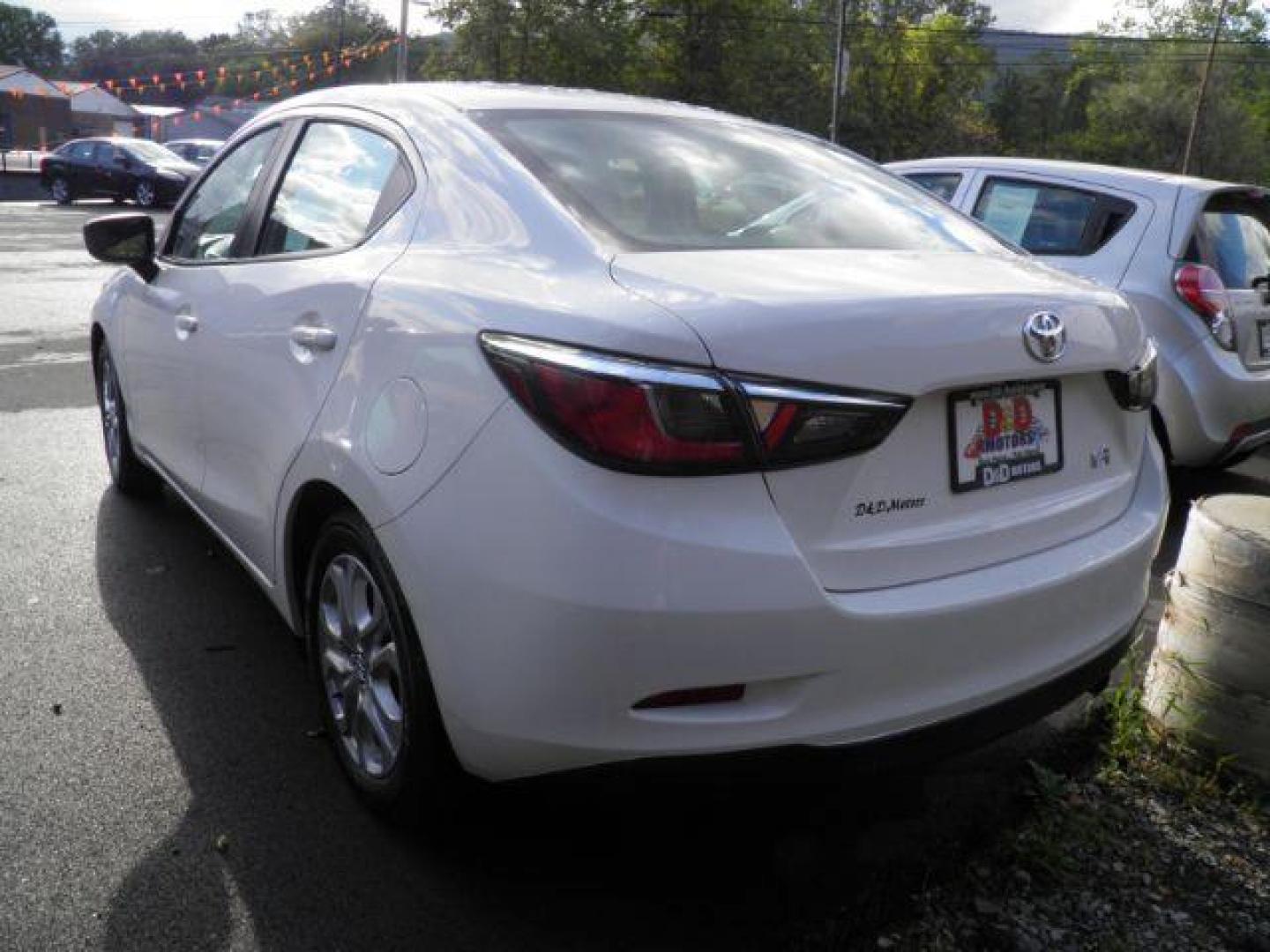 2018 White Toyota Yaris iA 6A (3MYDLBYV8JY) with an 1.5L I4 engine, AT transmission, located at 15520 McMullen Hwy SW, Belair, MD, 21502, (301) 729-3700, 39.581375, -78.846451 - Photo#4