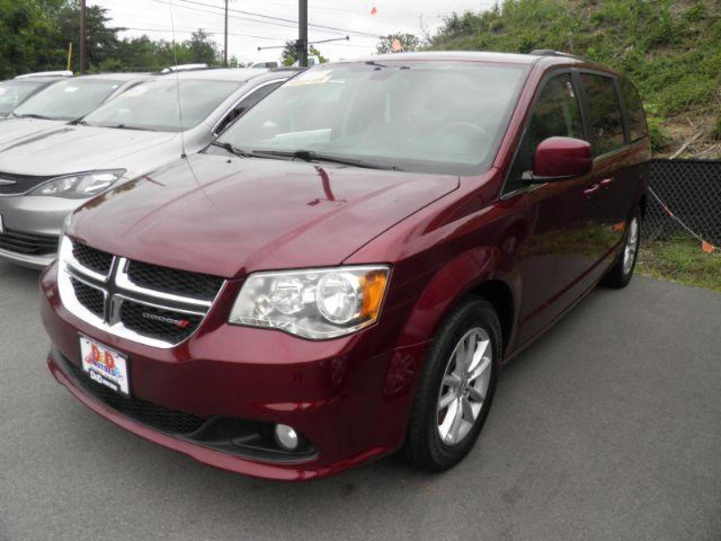 2019 Red Dodge Grand Caravan SXT (2C4RDGCG0KR) with an 3.6L V6 engine, AT transmission, located at 15520 McMullen Hwy SW, Belair, MD, 21502, (301) 729-3700, 39.581375, -78.846451 - Photo#0