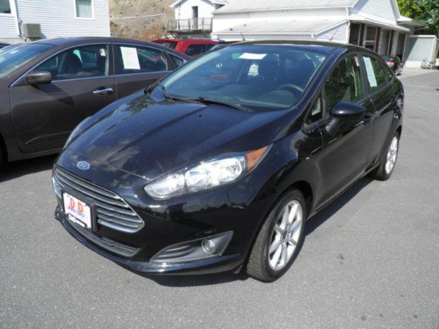 2019 Black Ford Fiesta SE Sedan (3FADP4BJ1KM) with an 1.6L I4 engine, AT transmission, located at 15520 McMullen Hwy SW, Belair, MD, 21502, (301) 729-3700, 39.581375, -78.846451 - Photo#0