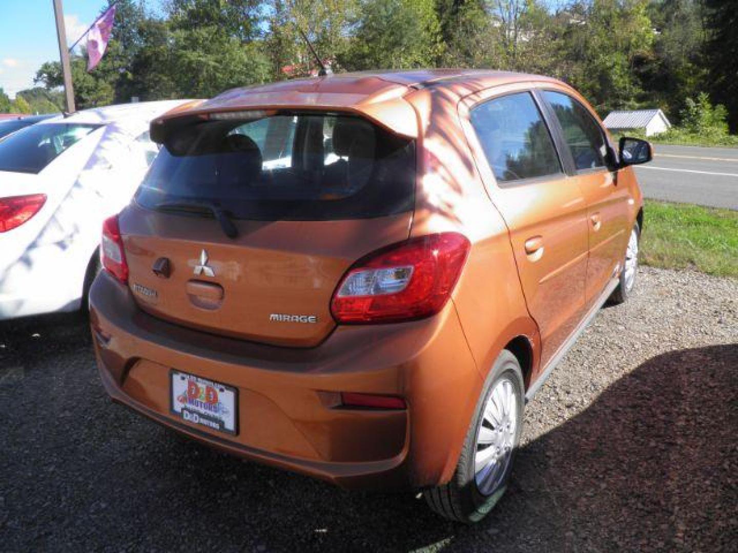 2019 Orange Mitsubishi Mirage ES 5M (ML32A3HJ6KH) with an 1.2L I3 engine, AT transmission, located at 19521 New George's Creek Rd SW, Barton, MD, 21521, (301) 463-2404, 39.524323, -79.017906- Photo#5