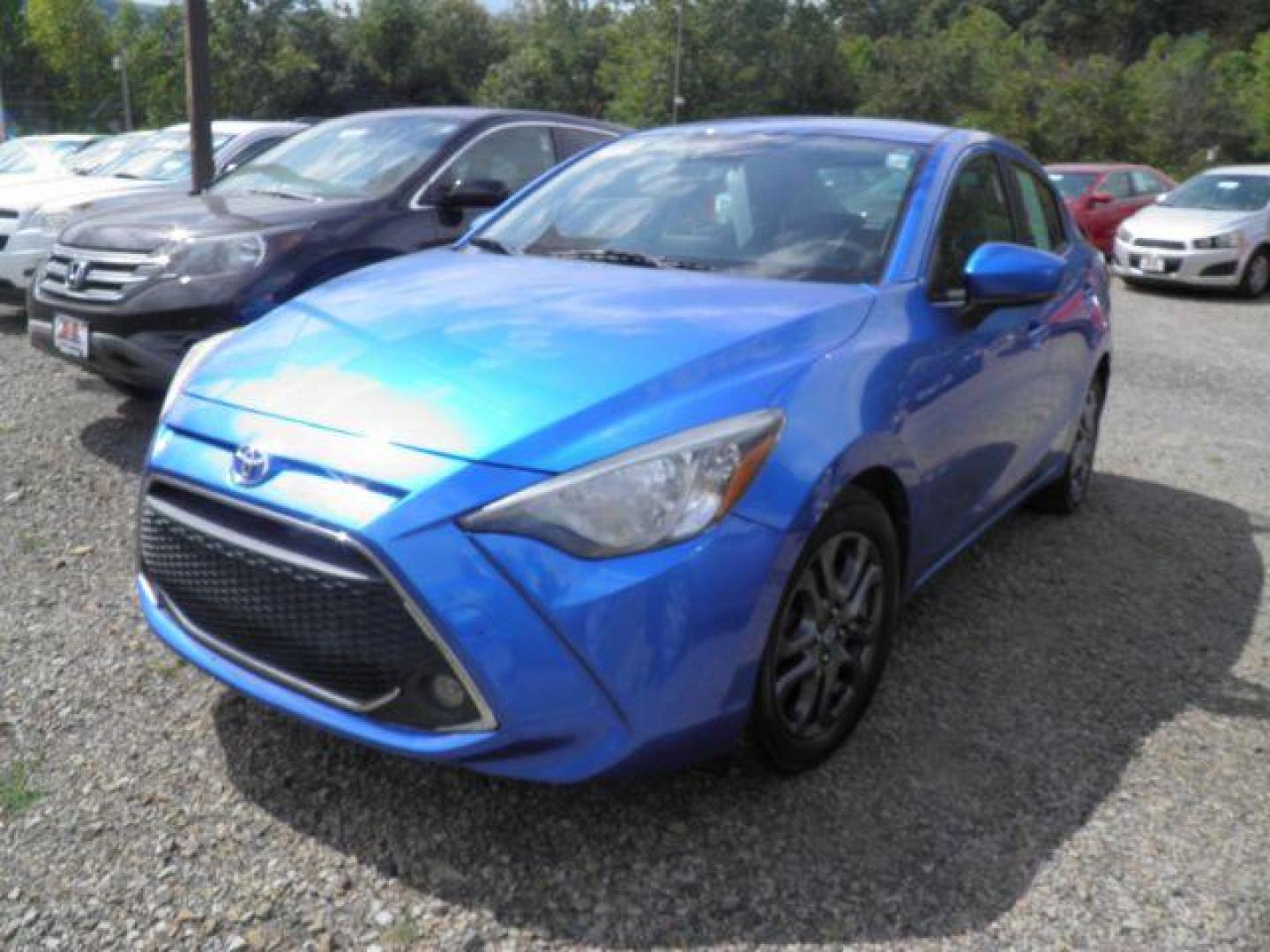 2019 BLUE Toyota Yaris iA 6M (3MYDLBYV7KY) with an 1.5l L4 engine, 6SP transmission, located at 19521 New George's Creek Rd SW, Barton, MD, 21521, (301) 463-2404, 39.524323, -79.017906 - Photo#0
