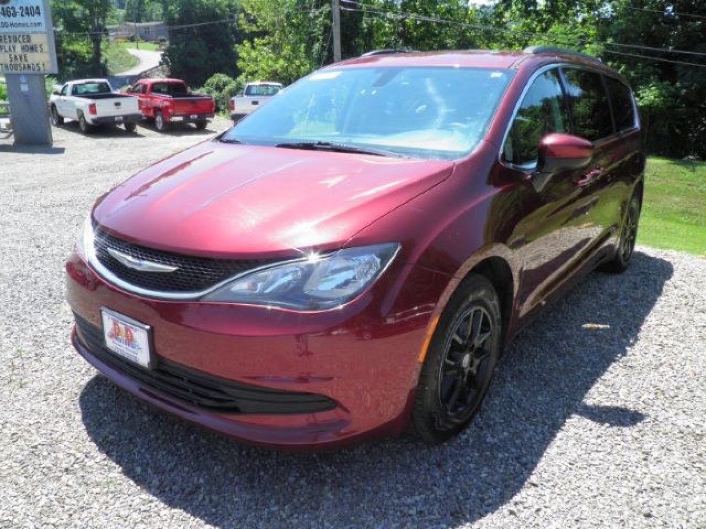 2020 RED Chrysler Voyager LXI (2C4RC1DG5LR) with an 3.6L V6 engine, AT transmission, located at 19521 New George's Creek Rd SW, Barton, MD, 21521, (301) 463-2404, 39.524323, -79.017906- Photo#0