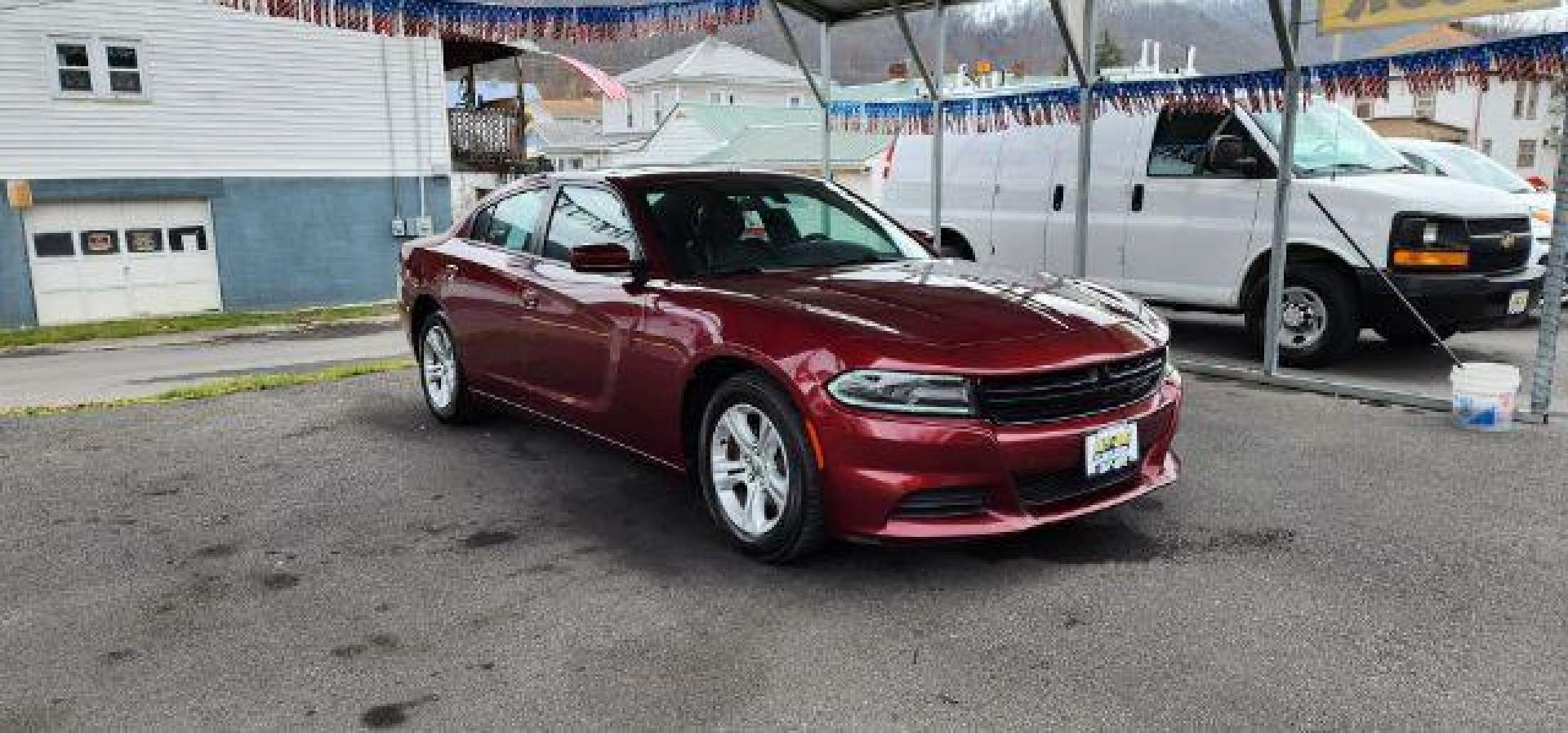 2021 Maroon /Black, premium leather Dodge Charger SXT (2C3CDXBG4MH) with an 3.6L V6 engine, AT transmission, located at 15520 McMullen Hwy SW, Belair, MD, 21502, (301) 729-3700, 39.581375, -78.846451 - FOR A BETTER PRICE CALL PAUL AT 301-268-8150 - Photo#0
