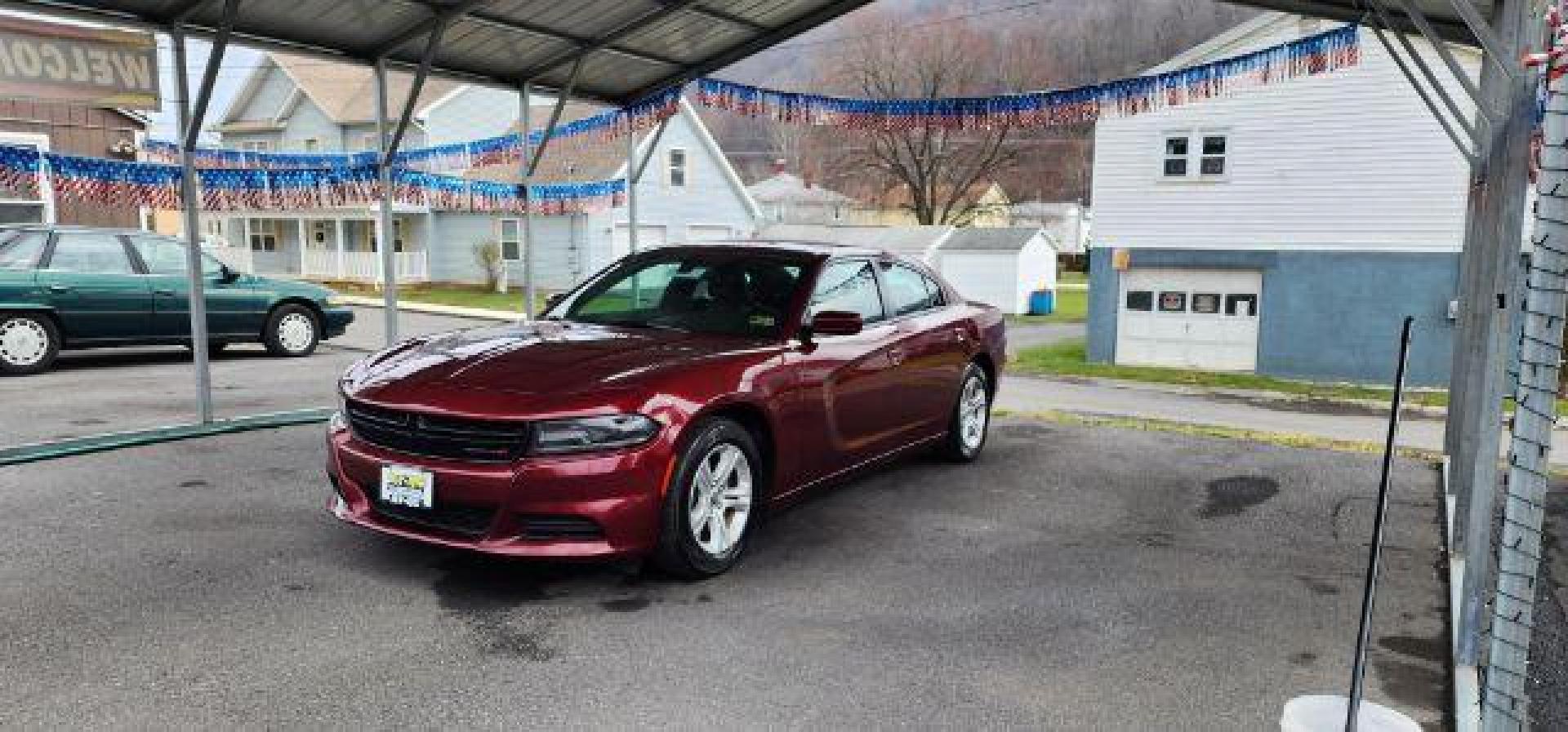2021 Maroon /Black, premium leather Dodge Charger SXT (2C3CDXBG4MH) with an 3.6L V6 engine, AT transmission, located at 15520 McMullen Hwy SW, Belair, MD, 21502, (301) 729-3700, 39.581375, -78.846451 - FOR A BETTER PRICE CALL PAUL AT 301-268-8150 - Photo#2