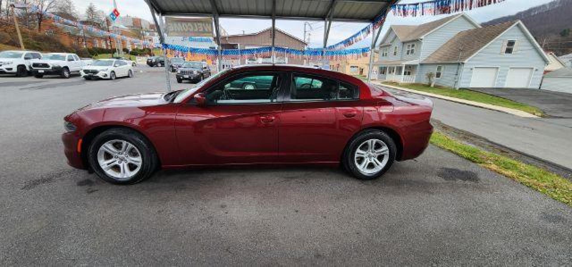 2021 Maroon /Black, premium leather Dodge Charger SXT (2C3CDXBG4MH) with an 3.6L V6 engine, AT transmission, located at 15520 McMullen Hwy SW, Belair, MD, 21502, (301) 729-3700, 39.581375, -78.846451 - FOR A BETTER PRICE CALL PAUL AT 301-268-8150 - Photo#3