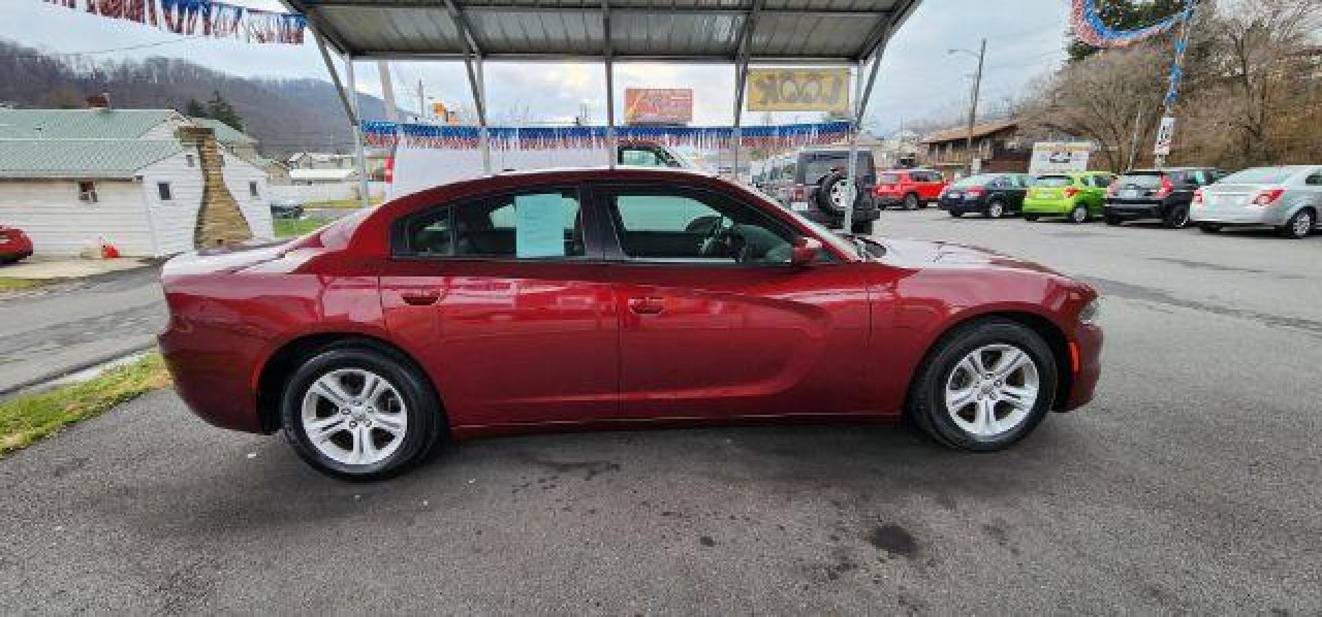 2021 Maroon /Black, premium leather Dodge Charger SXT (2C3CDXBG4MH) with an 3.6L V6 engine, AT transmission, located at 15520 McMullen Hwy SW, Belair, MD, 21502, (301) 729-3700, 39.581375, -78.846451 - FOR A BETTER PRICE CALL PAUL AT 301-268-8150 - Photo#13